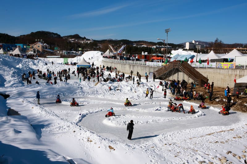 Visitors on the snow-covered grounds of the 2012 Daegwallyeong Snow Festival in Pyeongchang