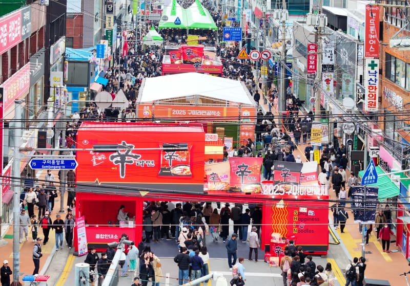 Ramyeon booths and crowds filling a downtown Gumi street at the 2025 Gumi Ramyeon Festival
