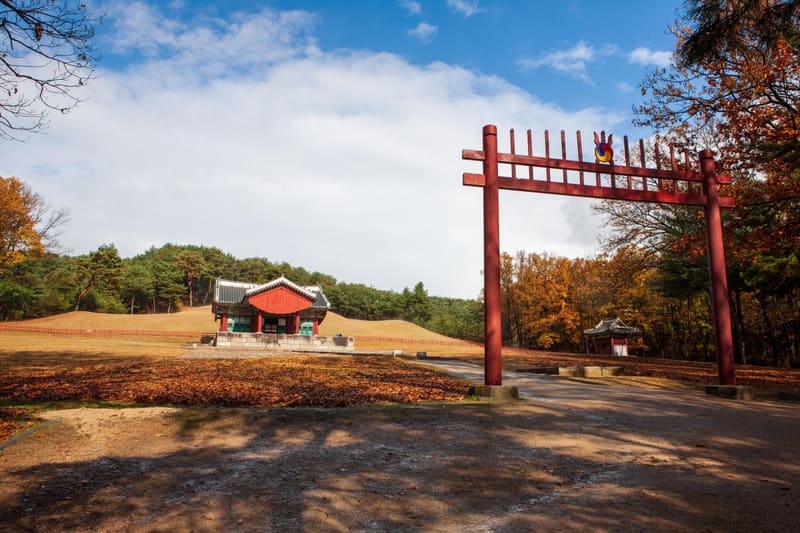 The red spirit gate and T-shaped shrine at the Yungneung and Geolleung royal tombs in Hwaseong in autumn