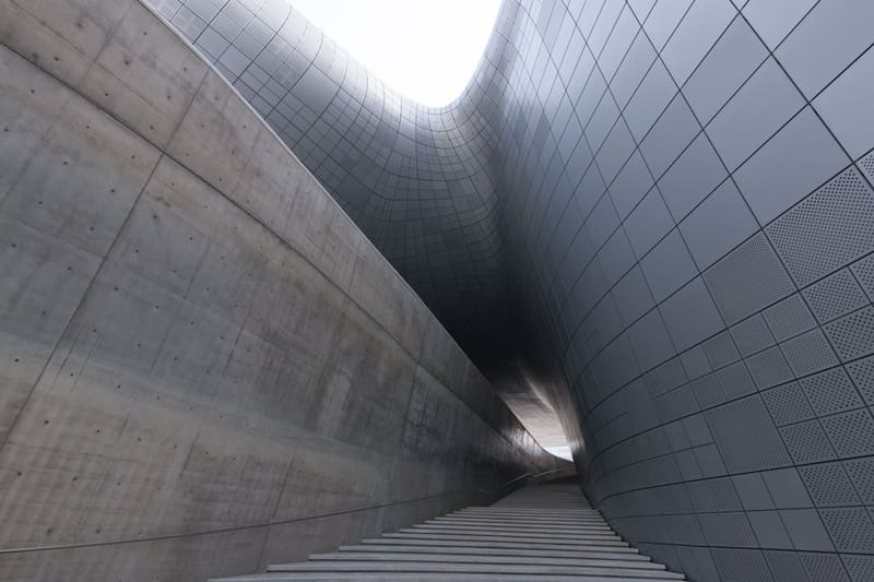 The curving walls and outdoor stairway of Dongdaemun Design Plaza (DDP), the Seoul Design Week venue