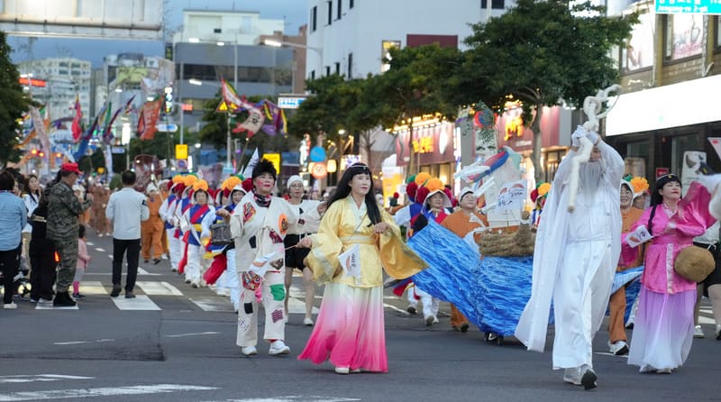 Performers in costume parading through the streets of Jeju City at the 63rd Tamna Culture Festival in 2024