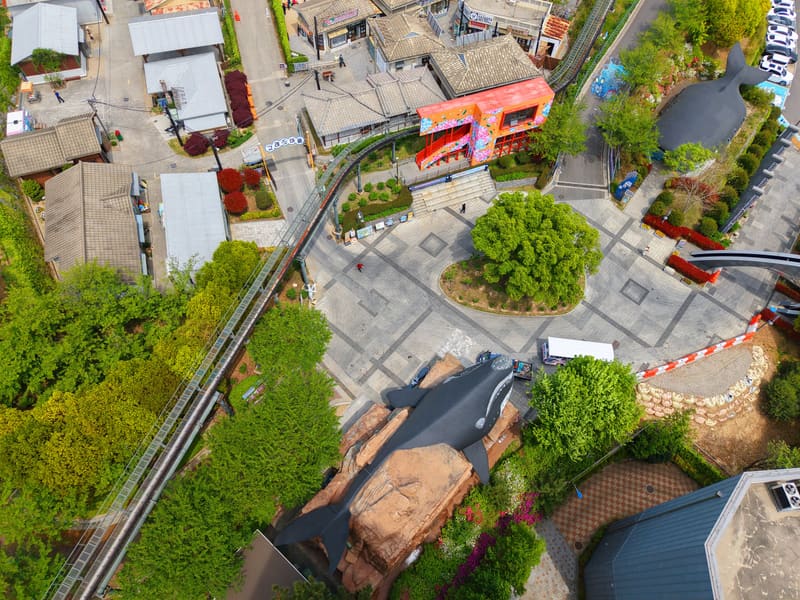 Overhead view of Jangsaengpo Whale Culture Village in Ulsan, with whale sculptures among the paths