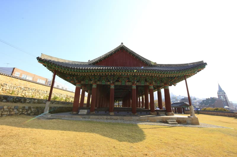 Jinnamgwan, the long 1599 naval hall in Yeosu and a National Treasure, seen across its lawn